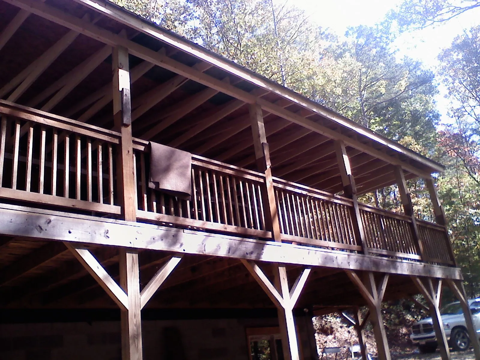 Timber framing under a new elevated porch and deck — Roof Leak Repair in Hyannis by Roofing Brothers